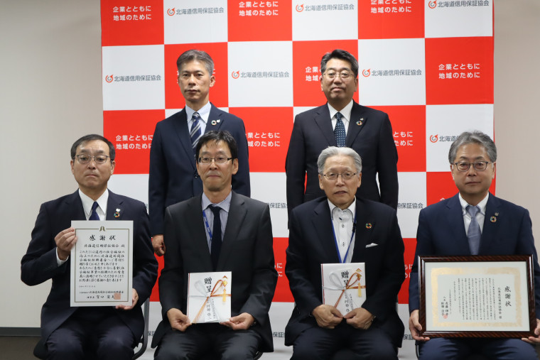 当協会田中常務理事(左上) 当協会栗山常務理事(右上) 当協会三原専務理事(左下) 杉原理事事務局長(左中下) 松本事務局長(右中下) 阿部会長(右下)